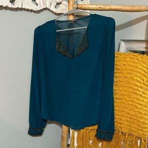 Francesca‘s blue blouse